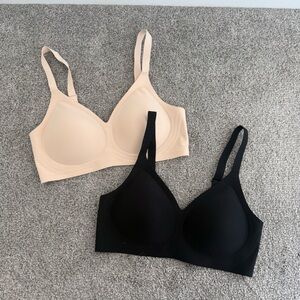 Elegant Black and Cream Bras
